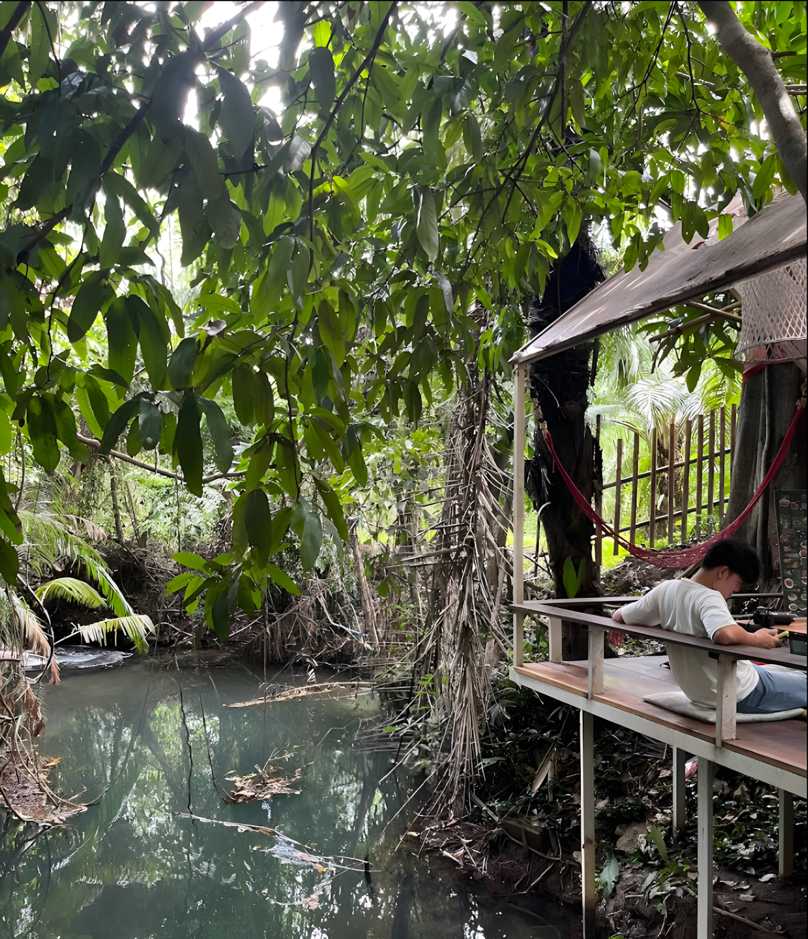 Riverside seating area with pond views